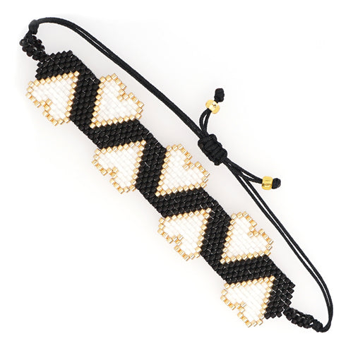 Pulsera Corazones Negro, Blanco y Dorado